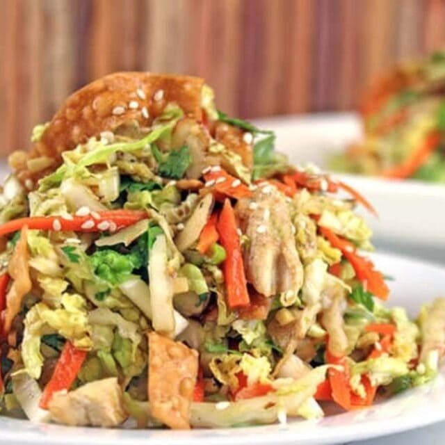 Salad in a white bowl.