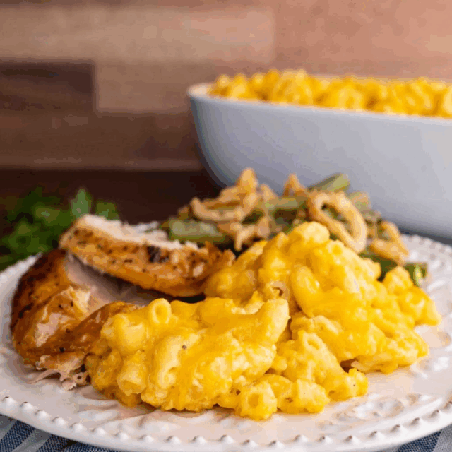 Side view of white plate with mac & cheese