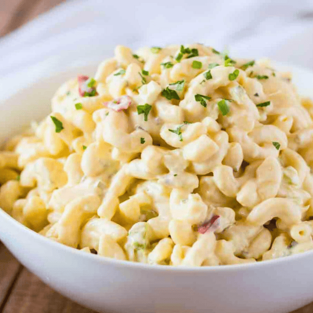 bowl of noodles mixed with dressing