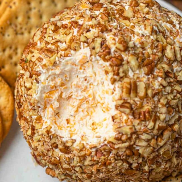 scoop taken out of cheese ball